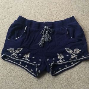 Blue Shorts with White Designers